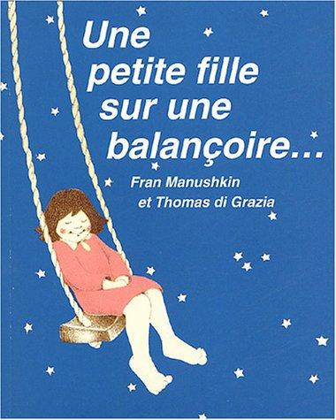 Une petite fille sur une balançoire