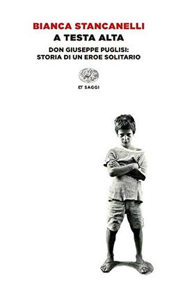 A testa alta. Don Giuseppe Puglisi: storia di un eroe solitario (Einaudi tascabili. Saggi)