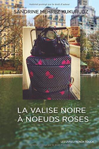 La valise noires à noeuds roses