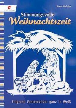 Stimmungsvolle Weihnachtszeit. Filigrane Fensterbilder ganz in Weiß