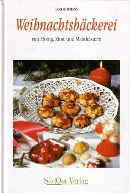 Weihnachtsbäckerei mit Honig, Zimt und Mandelkern