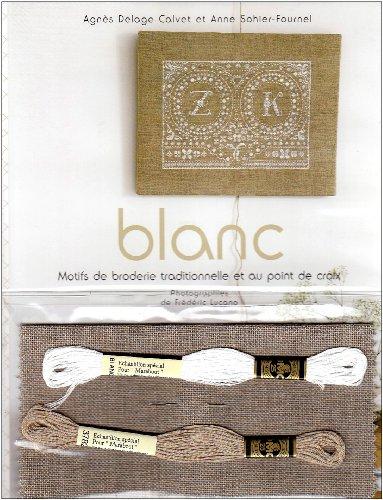 Blanc : motifs de broderie traditionnelle et au point de croix