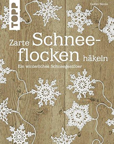 Zarte Schneeflocken häkeln: Ein winterliches Schneegestöber