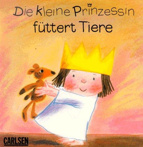 Die kleine Prinzessin füttert Tiere